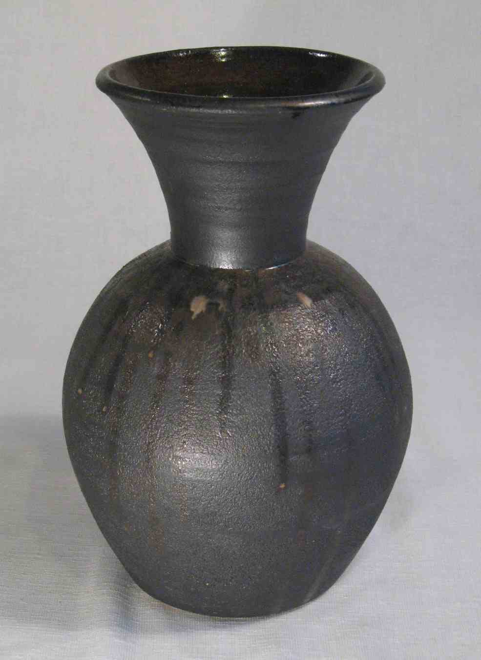 Maxwell Cowlin - black vase with trailed pattern