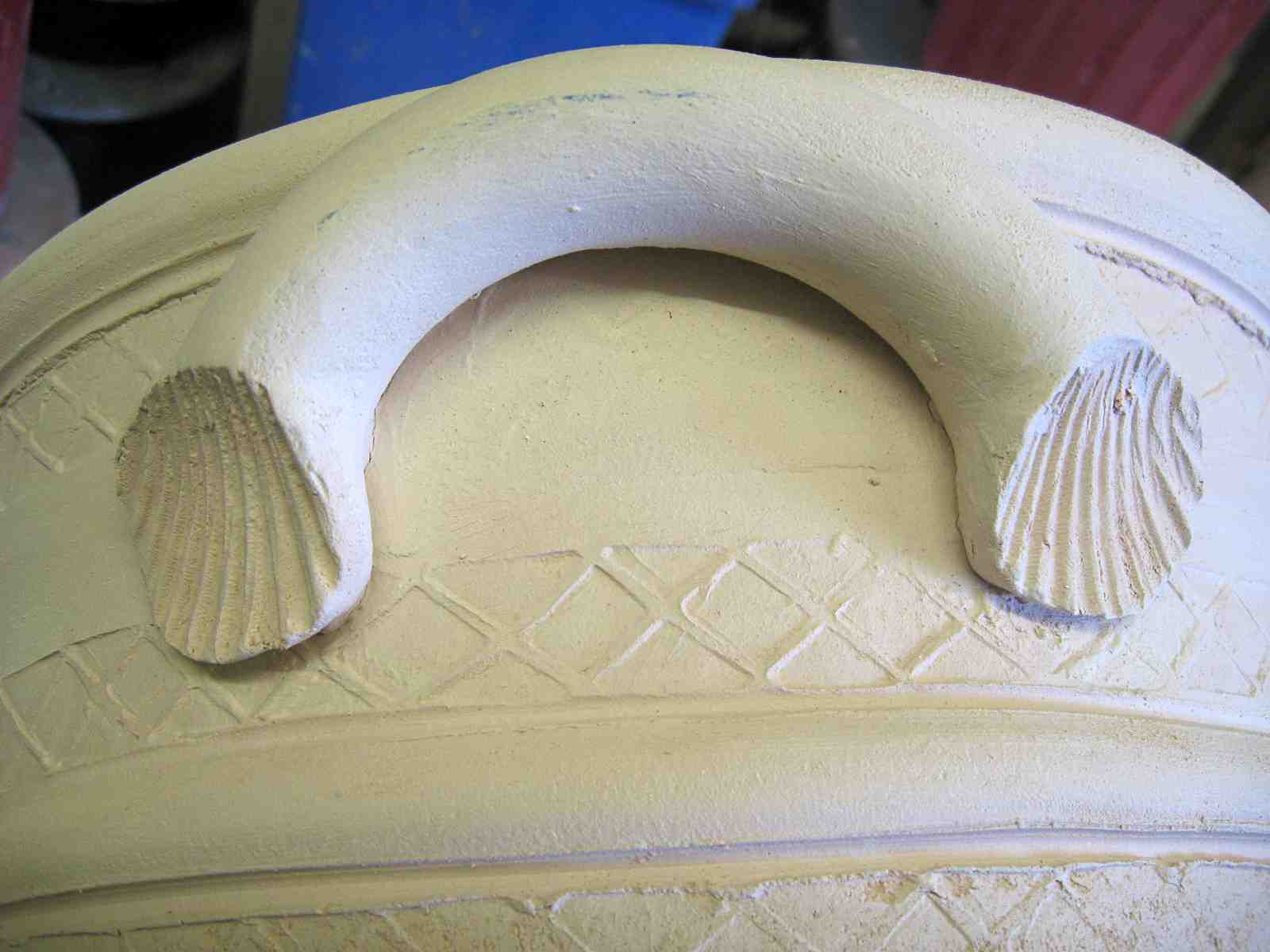 Closeup of a handle on a pot - Maxwell Cowlin